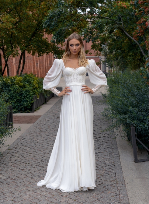Chiffon dress with a lace bustier bodice and voluminous sleeves